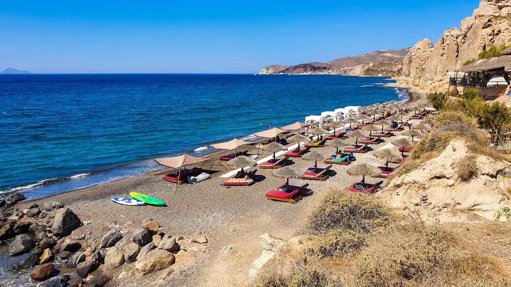 Umbrellas and loungers on Theros Beach